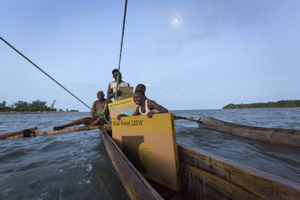 fisherman transporting solar panels